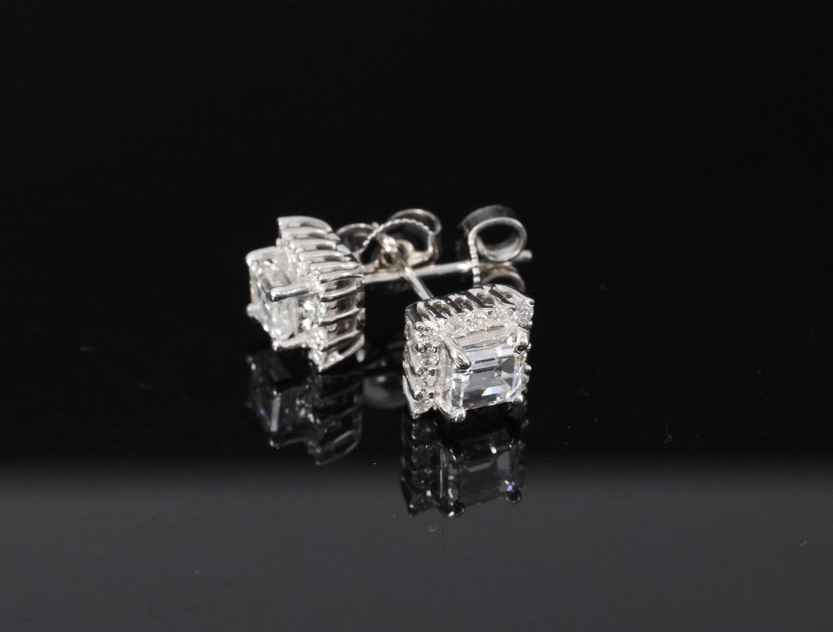 0.81ct DE/VS Emerald Cut & 0.28ct Rd Diamond 18K White Gold Stud Earrings