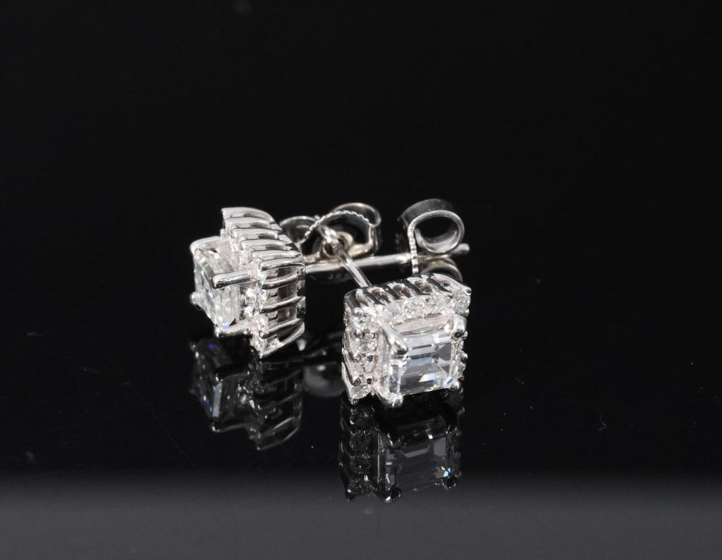 0.81ct DE/VS Emerald Cut & 0.28ct Rd Diamond 18K White Gold Stud Earrings