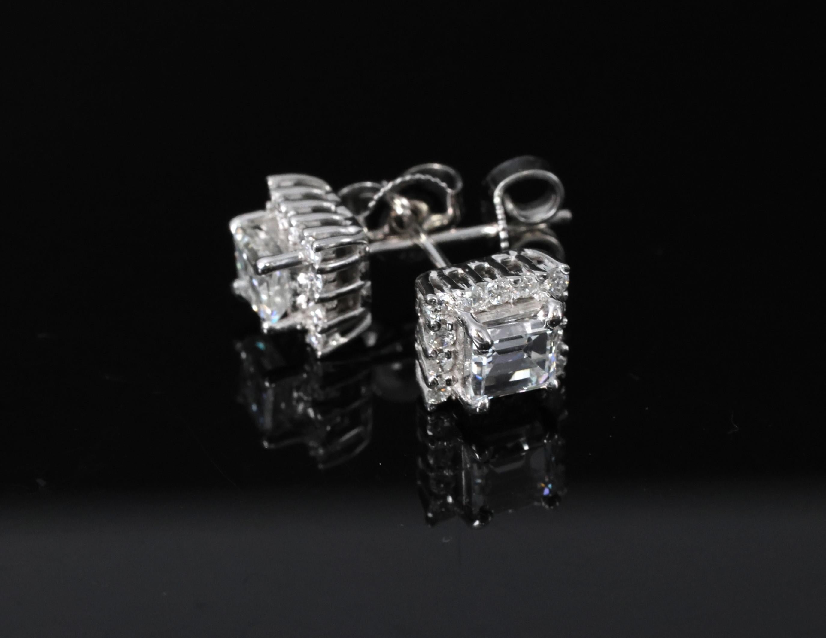 0.81ct DE/VS Emerald Cut & 0.28ct Rd Diamond 18K White Gold Stud Earrings