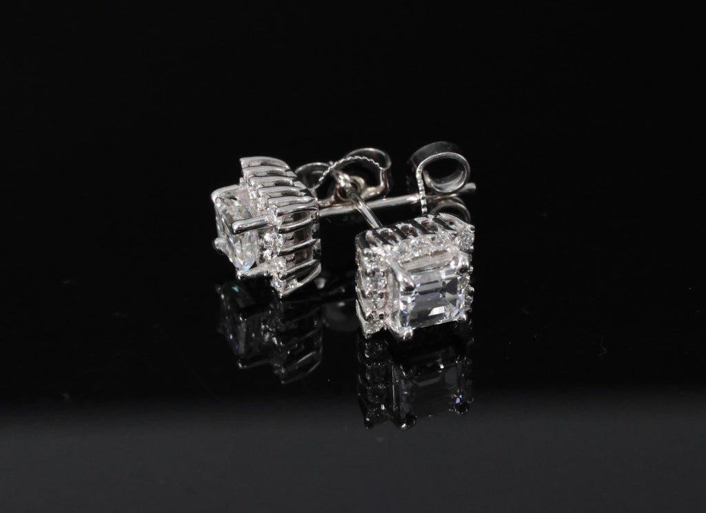 0.81ct DE/VS Emerald Cut & 0.28ct Rd Diamond 18K White Gold Stud Earrings