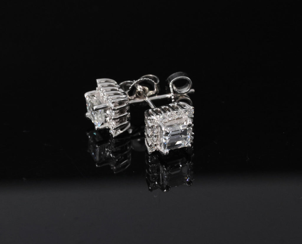0.81ct DE/VS Emerald Cut & 0.28ct Rd Diamond 18K White Gold Stud Earrings