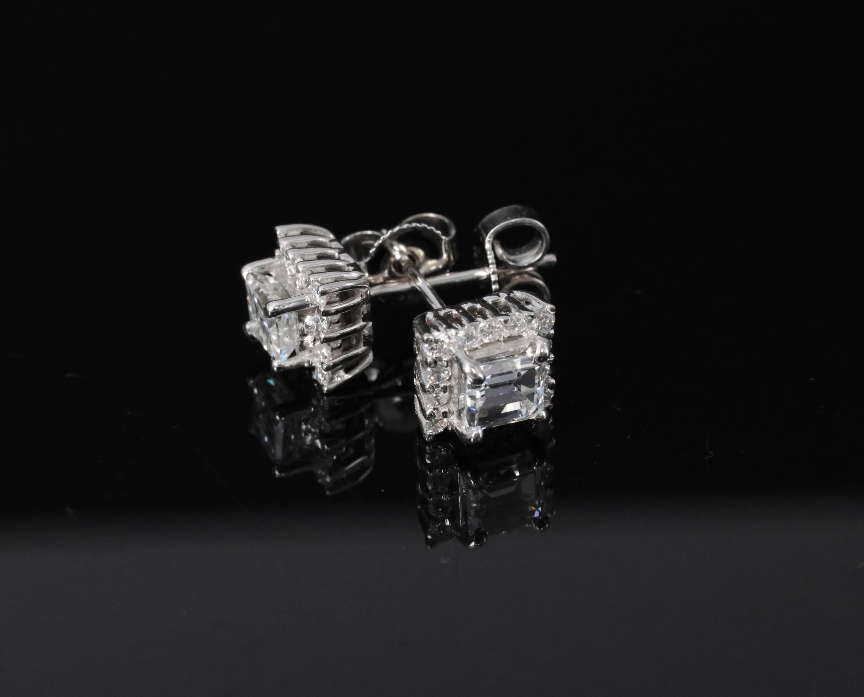 0.81ct DE/VS Emerald Cut & 0.28ct Rd Diamond 18K White Gold Stud Earrings