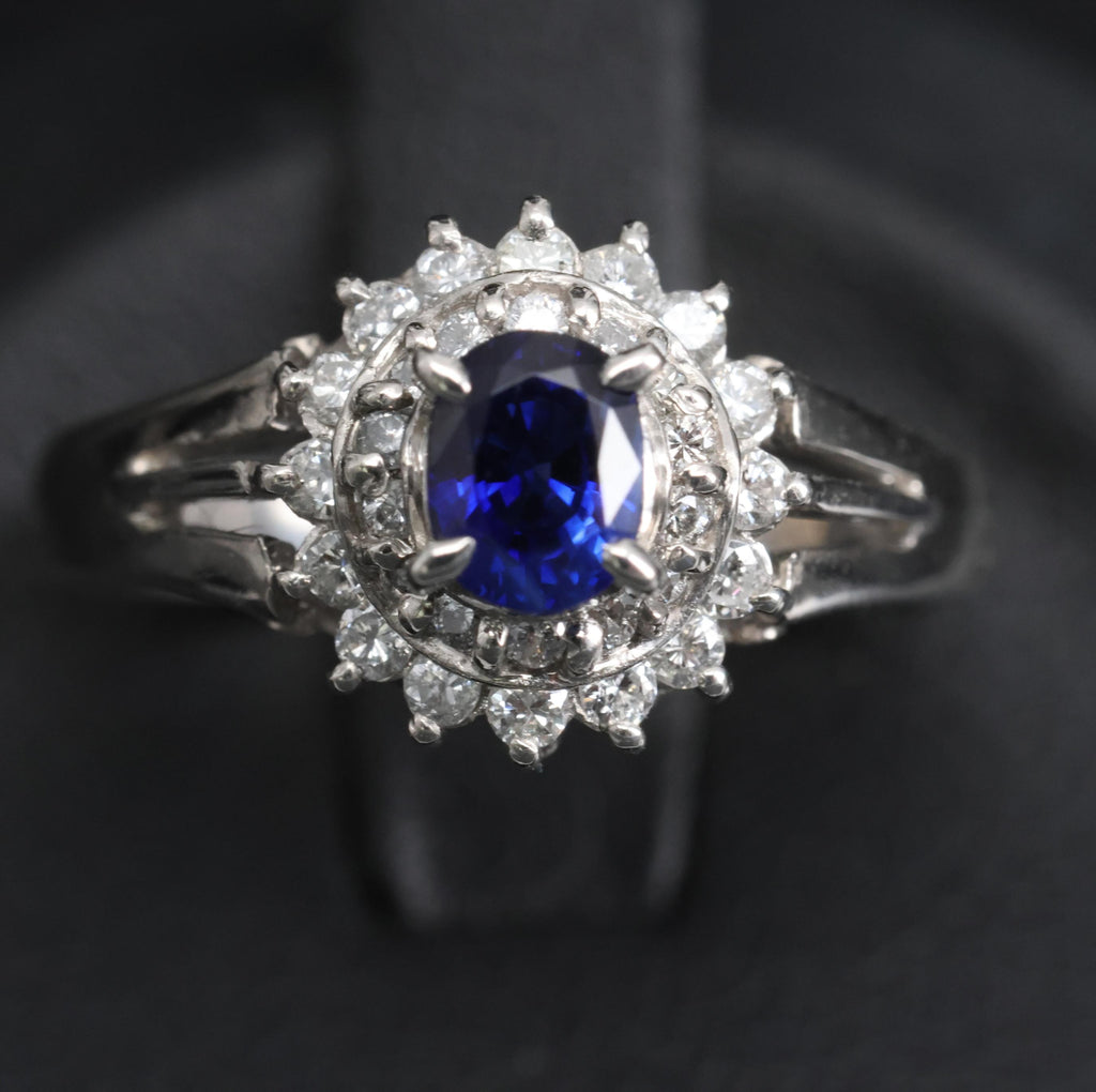 Fine 0.42ct Royal Blue Sapphire & 0.28ct Diamond Halo Platinum Ring, Size 5.5