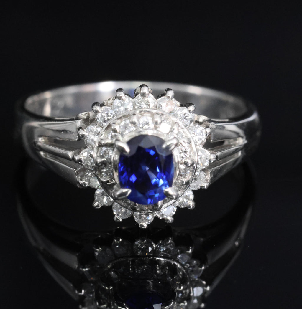 Fine 0.42ct Royal Blue Sapphire & 0.28ct Diamond Halo Platinum Ring, Size 5.5