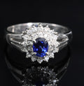 Fine 0.42ct Royal Blue Sapphire & 0.28ct Diamond Halo Platinum Ring, Size 5.5