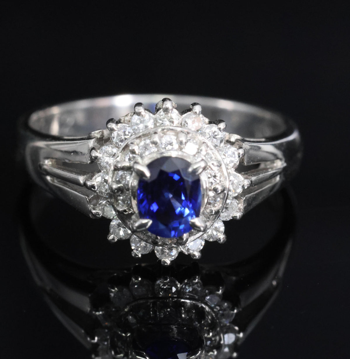 Fine 0.42ct Royal Blue Sapphire & 0.28ct Diamond Halo Platinum Ring, Size 5.5