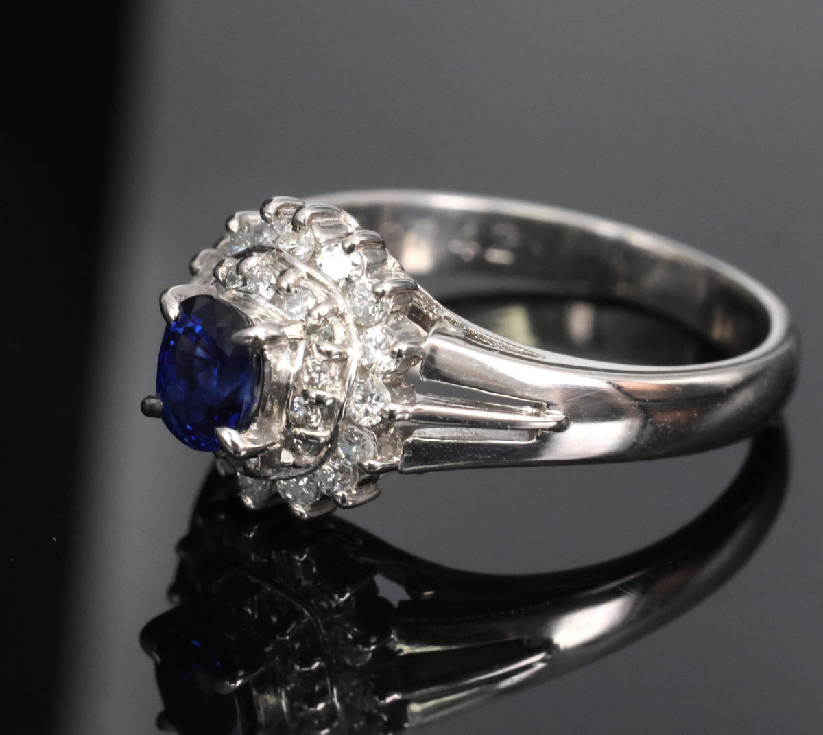 Fine 0.42ct Royal Blue Sapphire & 0.28ct Diamond Halo Platinum Ring, Size 5.5