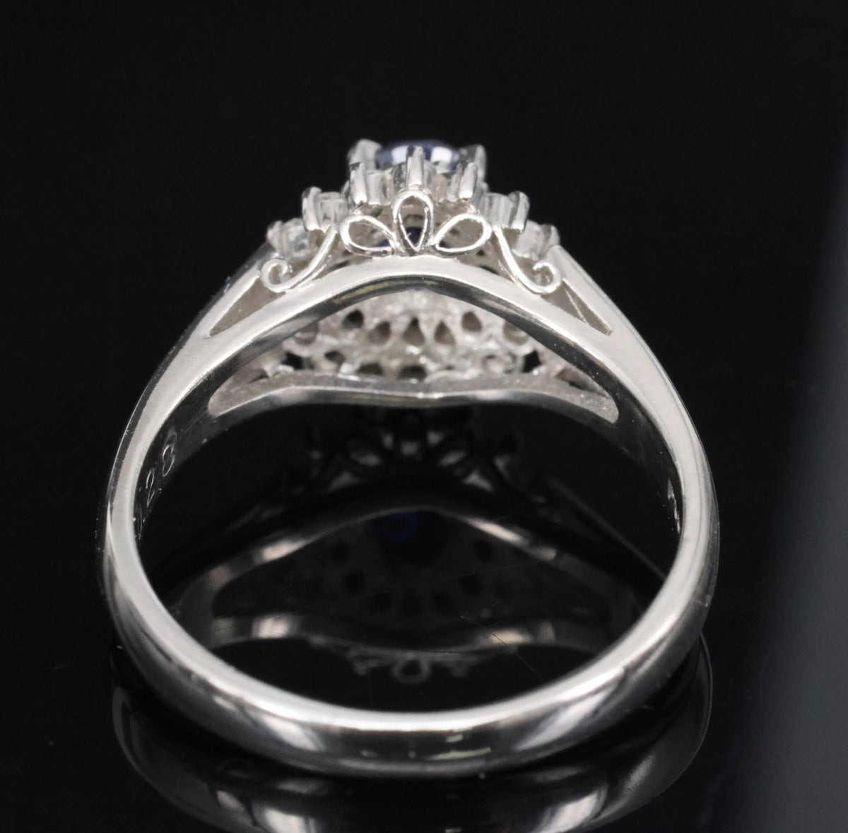 Fine 0.42ct Royal Blue Sapphire & 0.28ct Diamond Halo Platinum Ring, Size 5.5